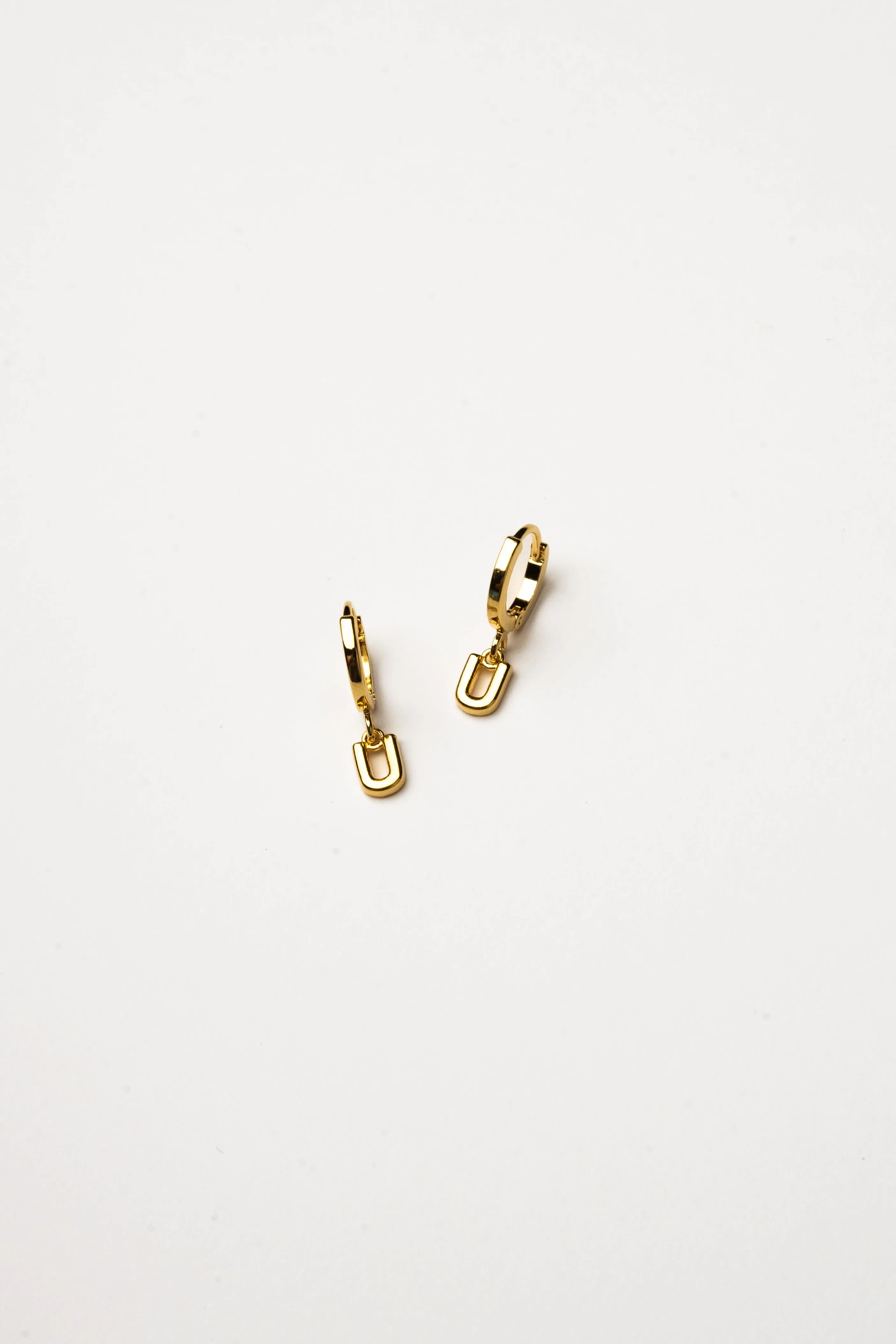 Cove Initial Letter Huggie Earrings