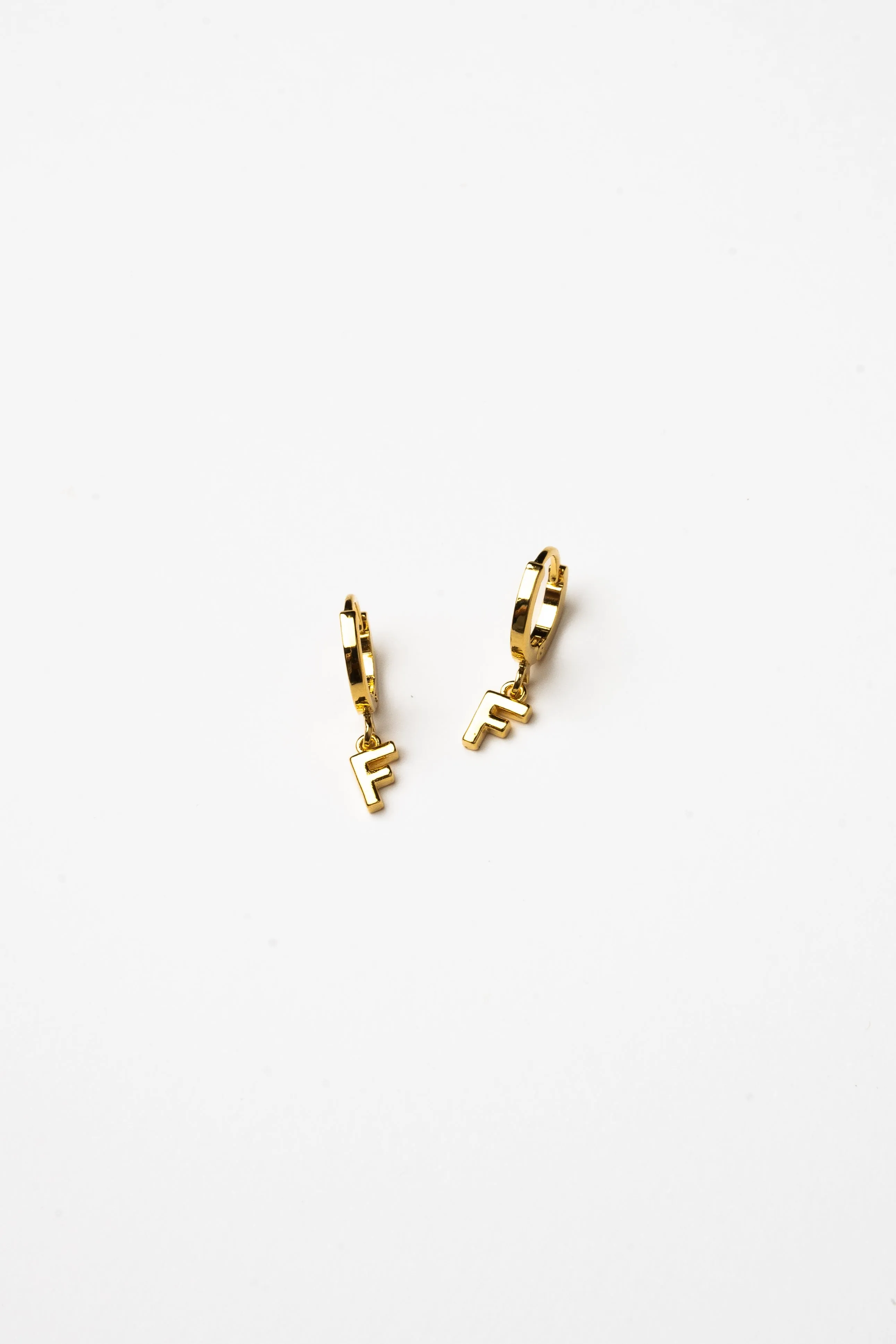 Cove Initial Letter Huggie Earrings