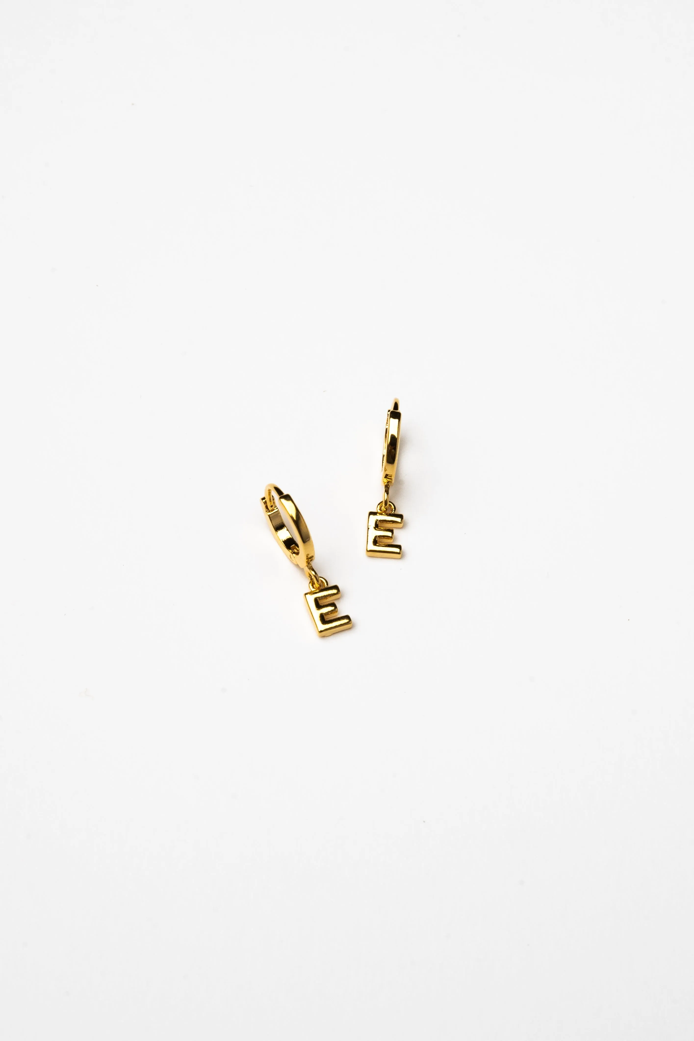 Cove Initial Letter Huggie Earrings